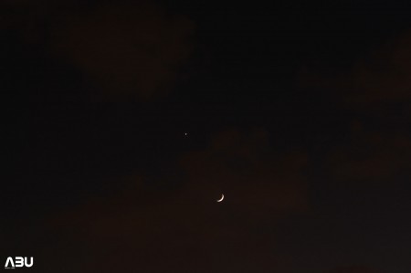 Beautiful pairing of Moon (behind thin clouds) and Venus Beautiful pairing of Moon (behind thin clouds) and Venus