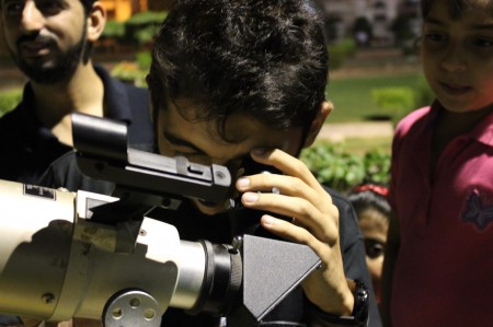 Me watching a planet with Sky Watcher's 100ED telescope.